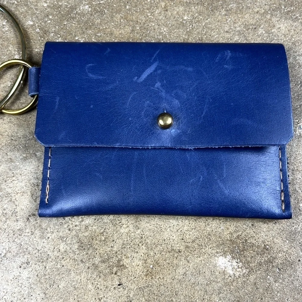 Elegant Blue Leather Key Holder with Tassel
